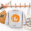 The Juniper Shop Dinosaur Moon Toddler Graphic Sweatshirt - 2 of 3