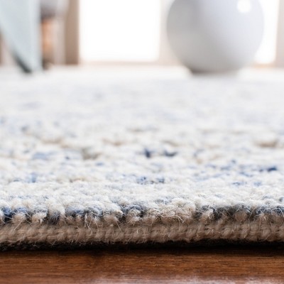 Ivory and Blue Hand-Tufted Wool 8' x 10' Area Rug