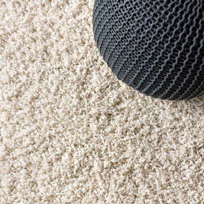 Cream 2 x 8 Shag Reversible Synthetic Area Rug with Tassels