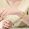 14K Yellow Gold Plated Slinky Link Chain Bracelet with Cubic Zirconi, featuring a dynamic design with sparkling stones for a touch of modern elegance - 2 of 3
