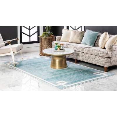Turquoise and Ivory Rectangular Stain-Resistant Synthetic Rug 4' x 6'