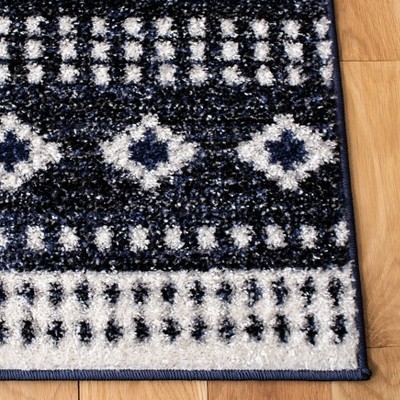 Ivory Elegance 54" Synthetic Hand-Knotted Easy-Care Area Rug