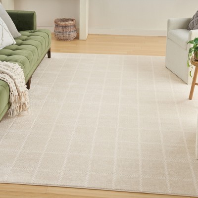 Ivory Cream Geometric 10' x 14' Synthetic Area Rug