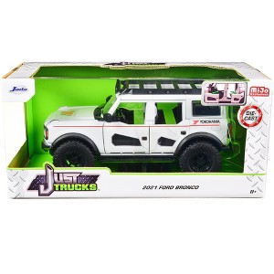 2021 Ford Bronco White with Red Stripes and Roof Rack "Yokohama Tires" "Just Trucks" Series 1/24 Diecast Model Car by Jada - 1 of 3