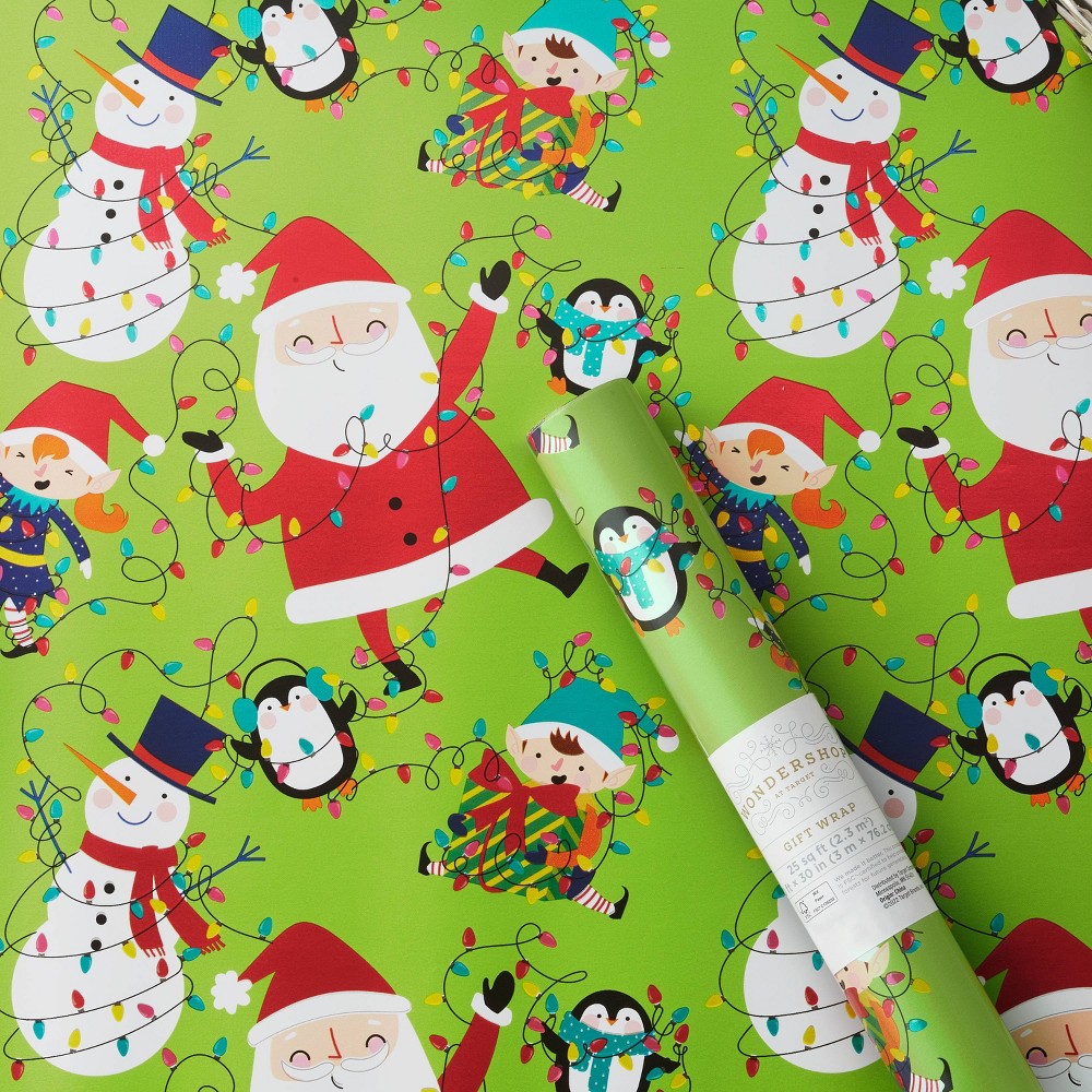 25 sq ft Santa and Elves Gift Wrap Green - Wondershop