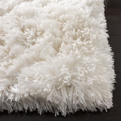 Ivory Hand-Tufted Shag Sheepskin 4' x 6' Area Rug
