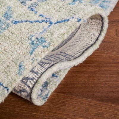Hand Tufted Silver and Blue Wool Floral Area Rug - 5' x 8'