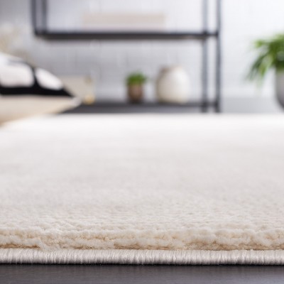 Ivory Solid Synthetic Easy-Care Hand-Knotted Rug
