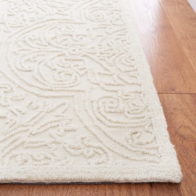 Ivory Hand-Tufted Wool and Synthetic 4' x 6' Area Rug