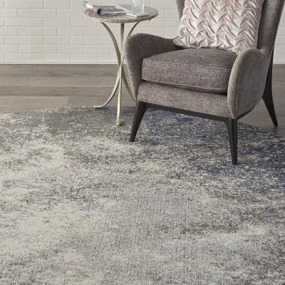 Large Round Gray and Ivory Synthetic Traditional Rug