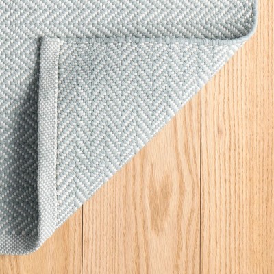 Light Blue and Ivory Herringbone Synthetic 2' x 3' Rug