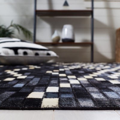 Black and Beige Handmade Geometric Cowhide Area Rug