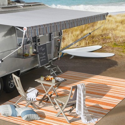 Castara Chic Orange & Cream Striped Synthetic 5x8 Area Rug