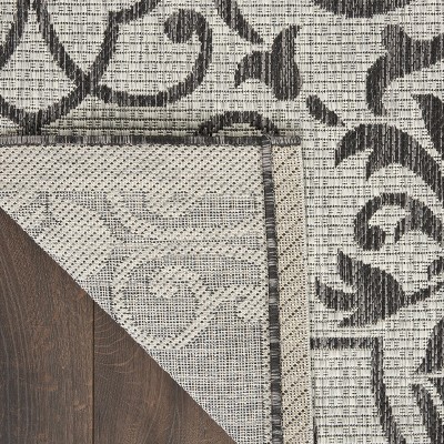 Ivory & Charcoal Round Synthetic Indoor/Outdoor Area Rug