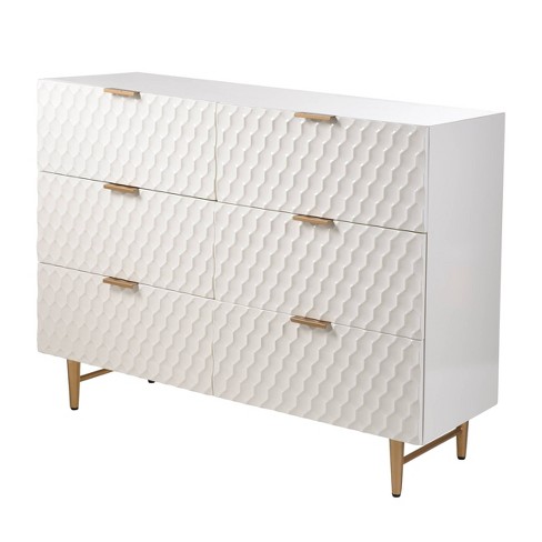 White dresser deals with gold accents