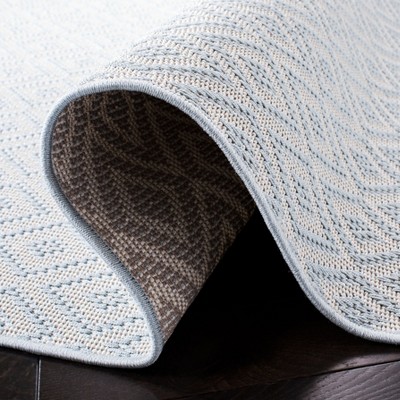Aqua and Cream Geometric Synthetic Runner Rug