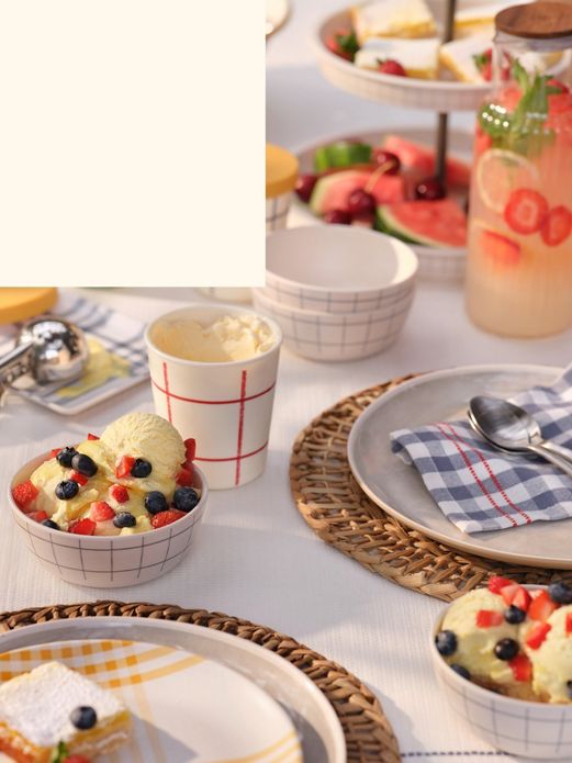 Summer tabletop items featuring various desserts, ice cream, fruit and lemon bars