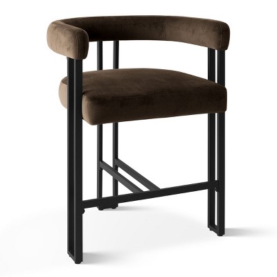 Side-angle view of brown velvet counter height bar stool