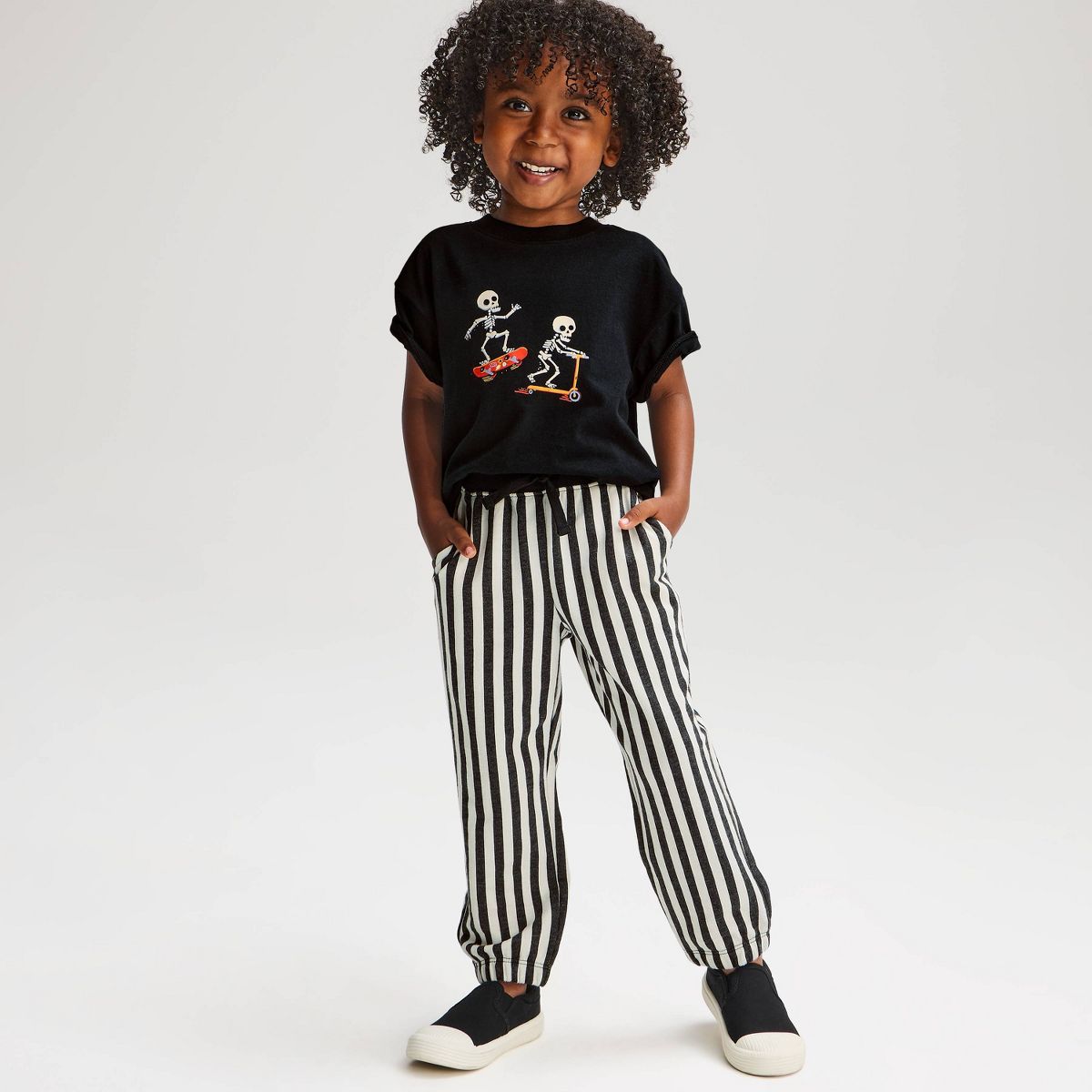 Toddler Boys' 2pc Halloween Skating Skeleton Short Sleeve French Terry Top & Bottom Set- Cat & Jack™ Black