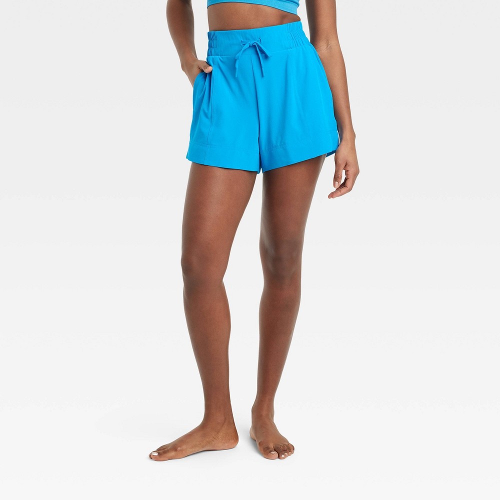 Size S Women's Flex Woven Mid-Rise Shorts 4" - All In Motion™ Blue 