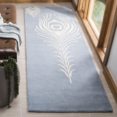 Handmade Light Blue and Ivory Wool Area Rug