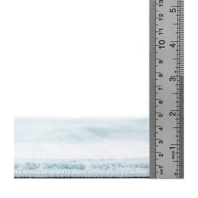 Turquoise and Ivory Rectangular Synthetic Area Rug