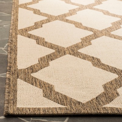 Cream and Beige Geometric Synthetic Rectangular Area Rug 5'3" x 7'6"