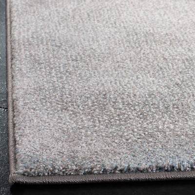 Celestial Abstract Blue & Grey Synthetic 9' x 12' Area Rug