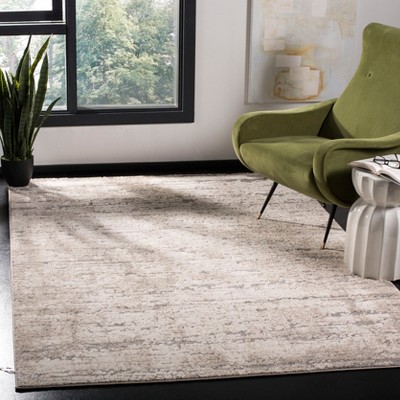 Ivory and Taupe Abstract High Pile Area Rug 4' x 6'