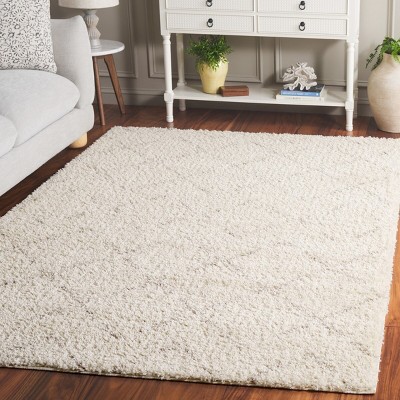 Ivory and Beige Geometric Shag 8' x 10' Area Rug
