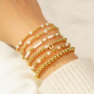 Turandoss 6PCS Gold Initial Bracelet for Women Girls - Stacked Beaded Bracelets for Kids, Layered Letter Pearl Bracelet Set for Girls, Christmas Gifts - 1 of 4