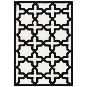 Cambridge CAM125 Tufted Indoor Rug - Safavieh - 1 of 3