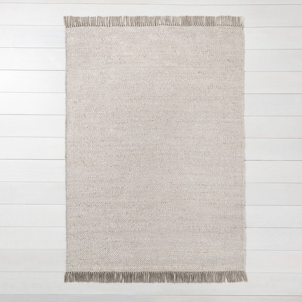5'x7' Bleached Jute Fringe Area Rug Gray - Hearth & Hand™ with Magnolia