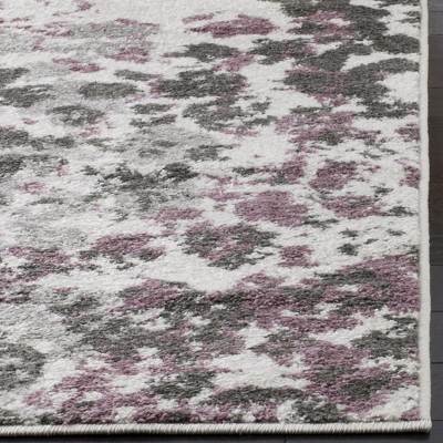 Ivory and Purple Floral Synthetic 10' x 14' Area Rug