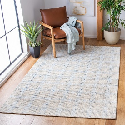 Ivory and Beige Abstract Handmade Wool Area Rug, 6' x 9'