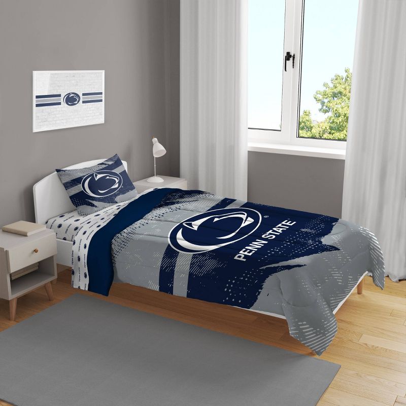 NCAA Penn State Nittany Lions Slanted Stripe Twin Bedding Set in a Bag - 4pc, 1 of 4