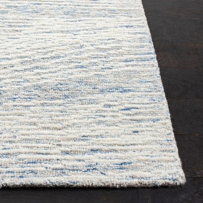 Light Blue Hand-Tufted Wool 6' x 9' Area Rug