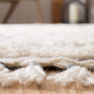 Casablanca Ivory and Black Wool 8' x 10' Hand-Knotted Shag Rug