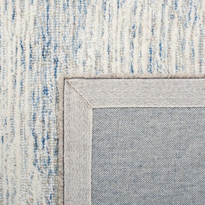 Light Blue Hand-Tufted Wool 6' x 9' Area Rug