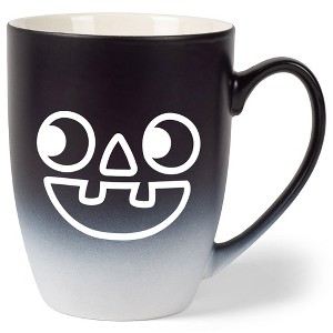 Elanze Designs Pumpkin Face Two Toned Ombre Matte Black and White 12 ounce Ceramic Stoneware Coffee Cup Mug - 1 of 4