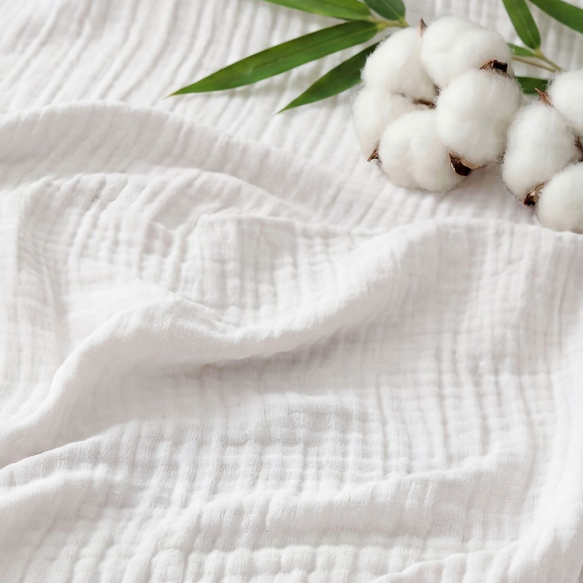Bedsure 100% Cotton Muslin Throw Blanket Large 50x70 Inches - 4-Layer Breathable and Lightweight Soft Summer Gauze Muslin Blanket for Adults, White