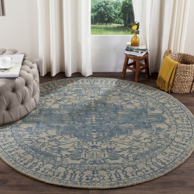 Ivory and Turquoise Round Tufted Wool Area Rug