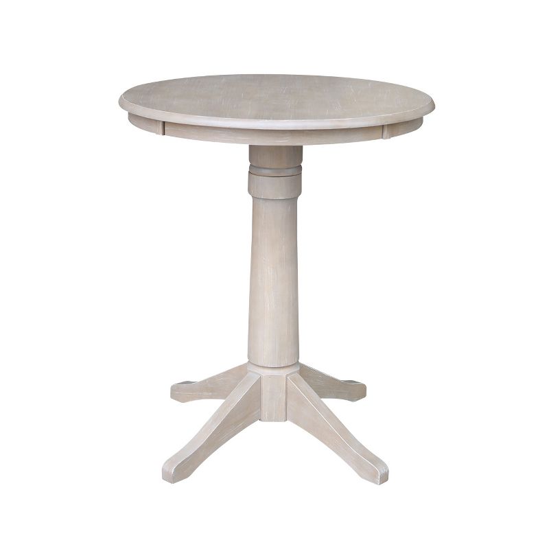 Solid Wood Round Pedestal Dining Table Weathered Gray Taupe - International Concepts, 1 of 7