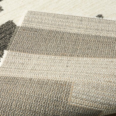 Brynja Off-White and Black Geometric Synthetic Area Rug