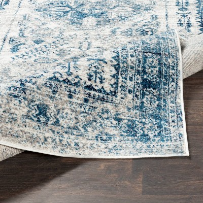 Elegant Sky Blue 9' x 12' Synthetic Stain-Resistant Area Rug