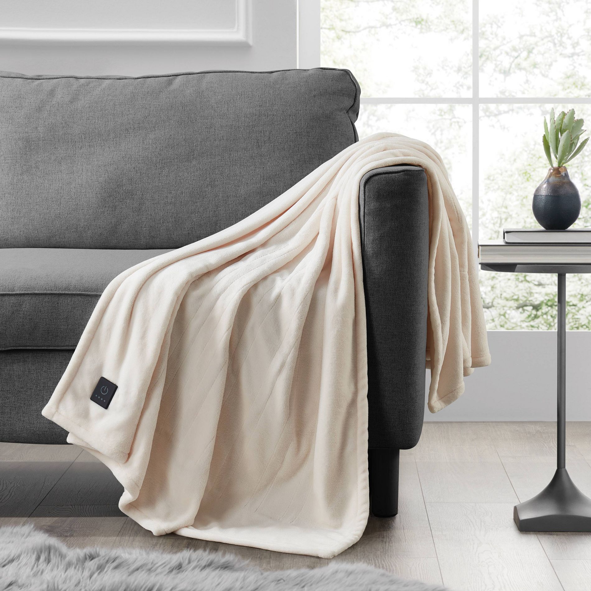 Brookstone Heated Solid Plush Throw Ivory
