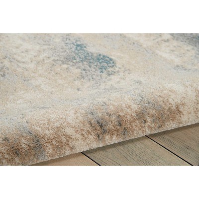 Ivory and Teal Abstract Rectangular Synthetic Rug 9'3" x 12'9"