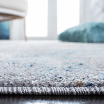 Abstract Blue Elegance 8' x 10' Synthetic Area Rug