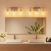 Tribesigns Modern Bathroom Vanity Light Fixtures, 3-Light Wall Sconces Lighting with Clear Glass Shade, Silver - 2 of 4