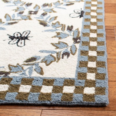 Ivory Floral Hand-Hooked Wool Rectangular Area Rug